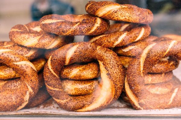 Stacks of Turkish bagels or Simits with sesame seeds for sale in Istanbul, Turkey