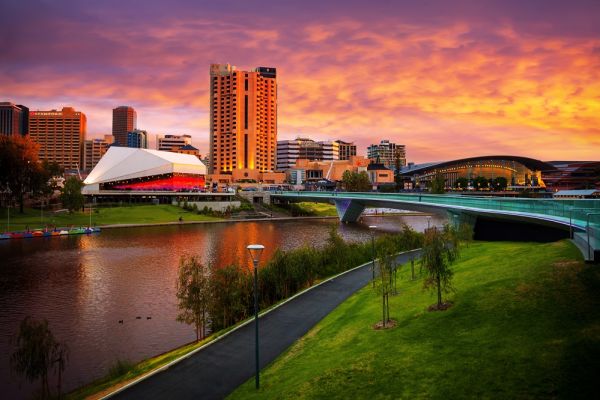 Adelaide skyline with river at sunset