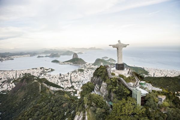 Distant view of Christ the redeemer looking over the city of Rio de Janeiro