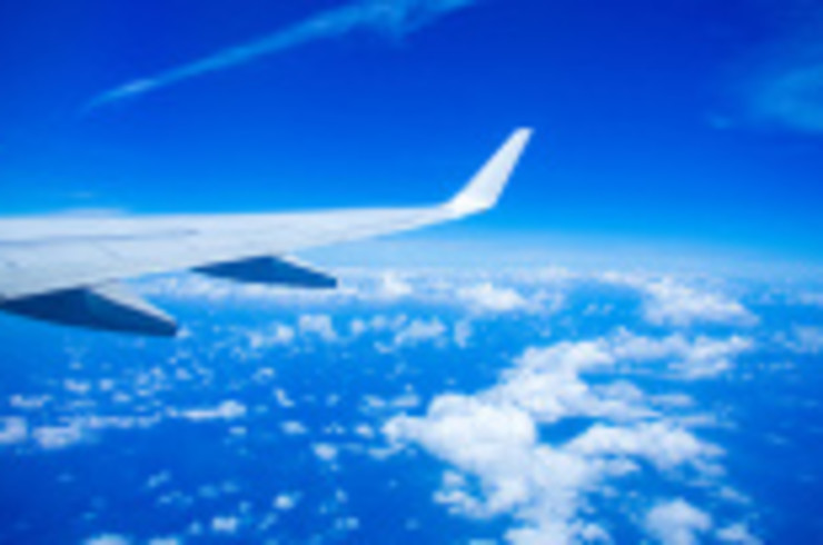 A view of an SAA airplane's wing during a flight.