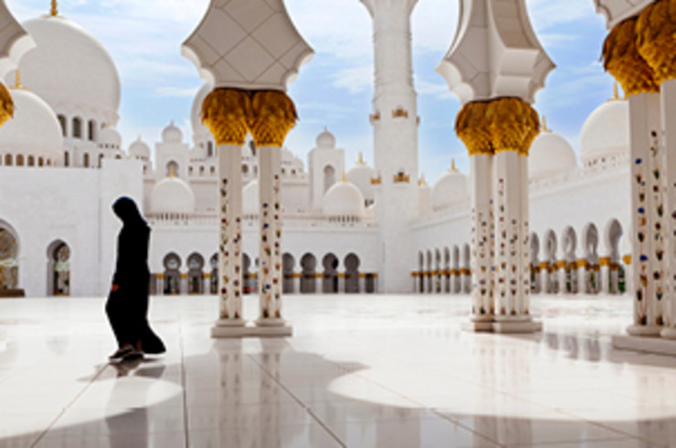 Lady walking in Mosque