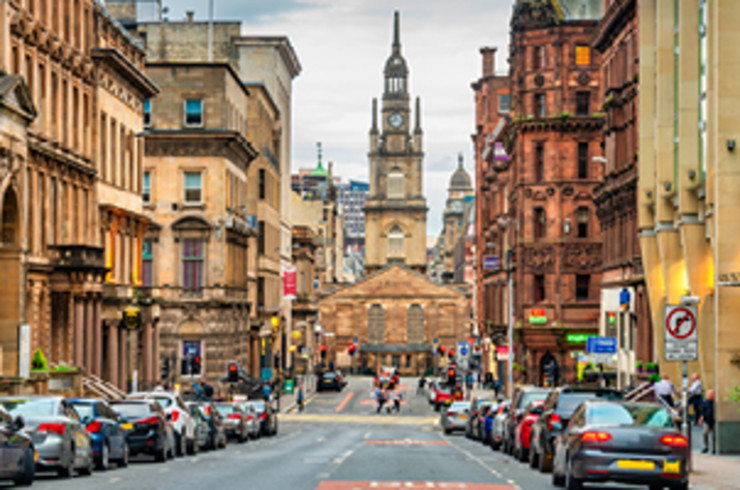 road and city of glasgow during the day