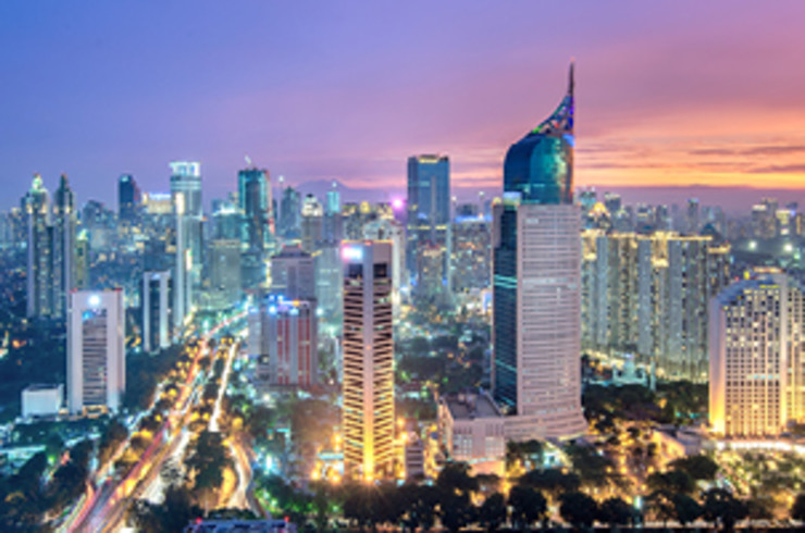 jakarta city at night with buildings lit up