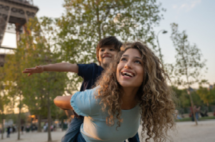 Mother and son in front of the Eiffel Tower