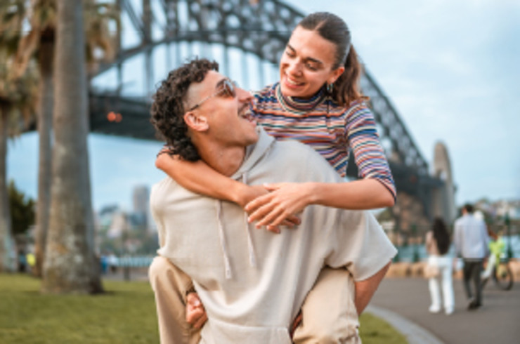 Couple in front of the Sydney Harbour Bridge