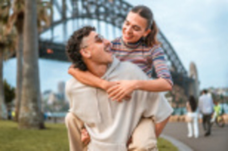 Couple in front of the Sydney Harbour Bridge