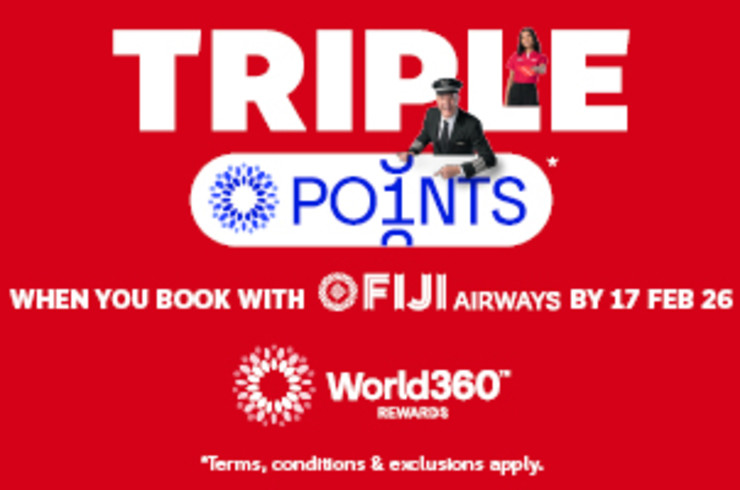 Wing of a plane with clouds