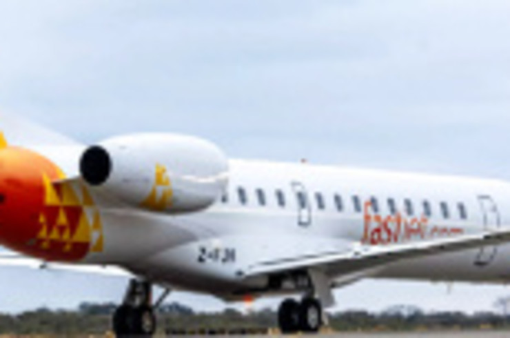 A view of a Fastjet airplane that is preparing to leave the airport on a booked flight.
