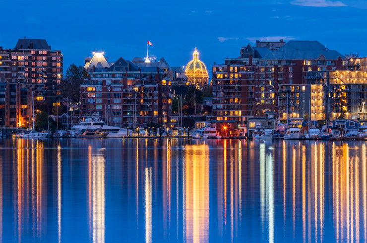 Victoria British Colombia city at night, reflected in a lake