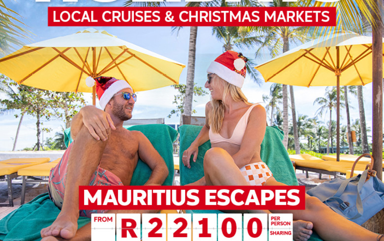 A view of a couple on a December beach holiday.