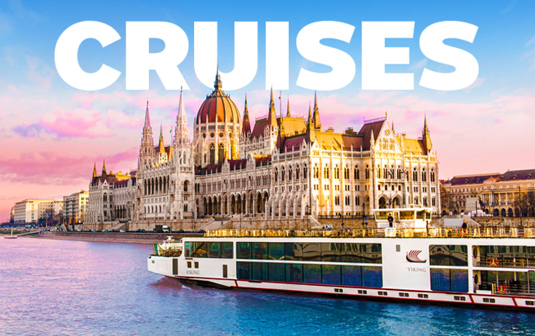 Cruises - River cruise ship sailing past the Hungarian Parliament Building