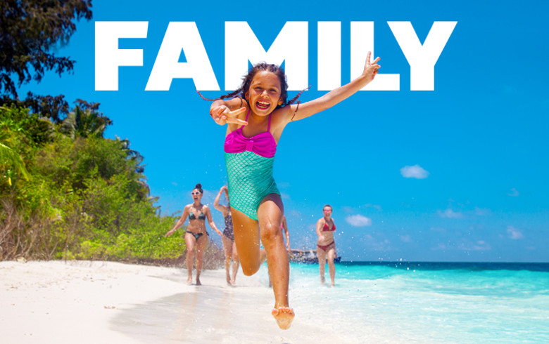 Family - children running on a beach
