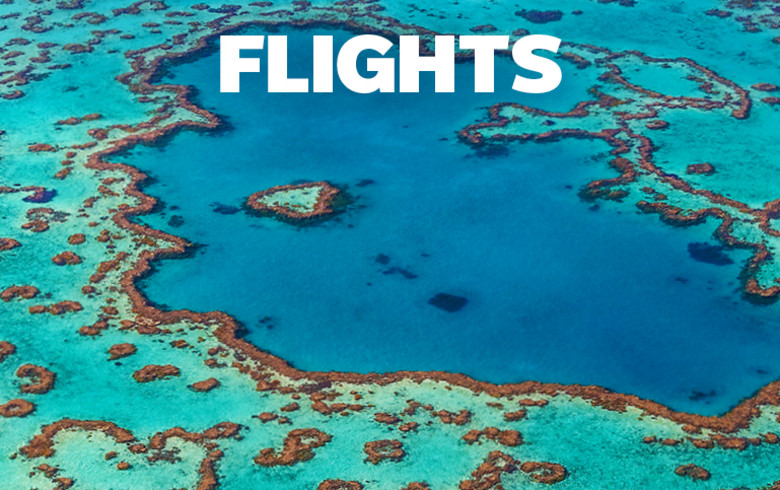  'Queensland Flights' banner depicting Heart Island in the Great Barrier Reef