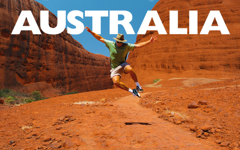 Australia - man jumping for joy in the Australian outback