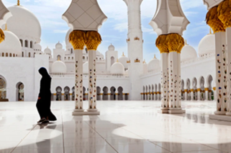 Lady walking in Mosque