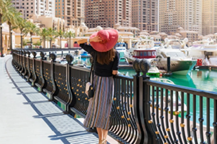 Standing in front of a marina