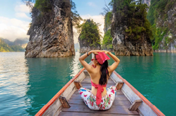 Lady on a boat in the Phi Phi Islands
