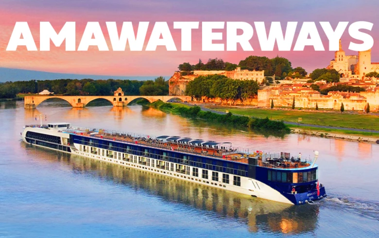 AMA Waterways - river cruise ship sailing past a castle in Europe
