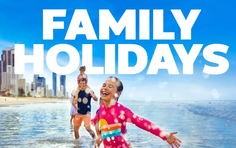 Family holidays | family playing in the surf on the Gold Coast