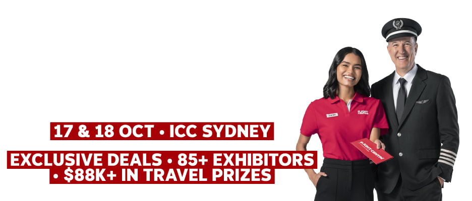 Flight Centre Captain and Co-Captain celebrating the Flight Centre Travel Expo in ICC Sydney, featuring exclusive deals and $88k+ in travel prizes