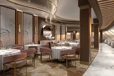 An artist's render shows floor-to-ceiling windows meet soft bronze accents and plush seating in Sonata's Grand Dining Room.
