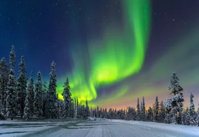 The northern lights, or Aurora Borealis, are a natural light phenomenon that occurs in the Arctic regions of the northern hemisphere as seen here in Finland.