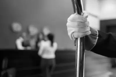 Bellman wheels trolley gloved hand