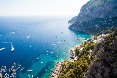 Looking down at the coastline of Capri. Image: Getty