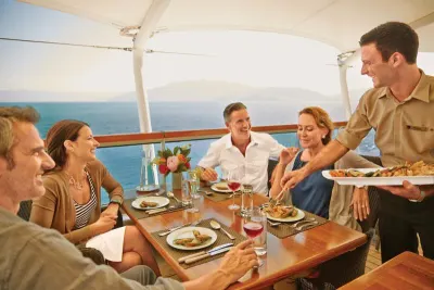 Group dines on board a luxury cruise ship