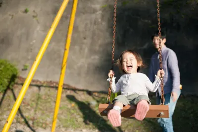 Kid on swing