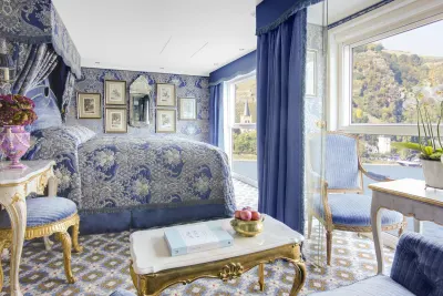 Each category of stateroom takes on a different palette and all have a canopied made-to-order Savoir bed, (acknowledged as the world's best), the finest monogrammed linen and marble bathrooms. Image courtesy of the Uniworld Boutique River Cruise Collection.