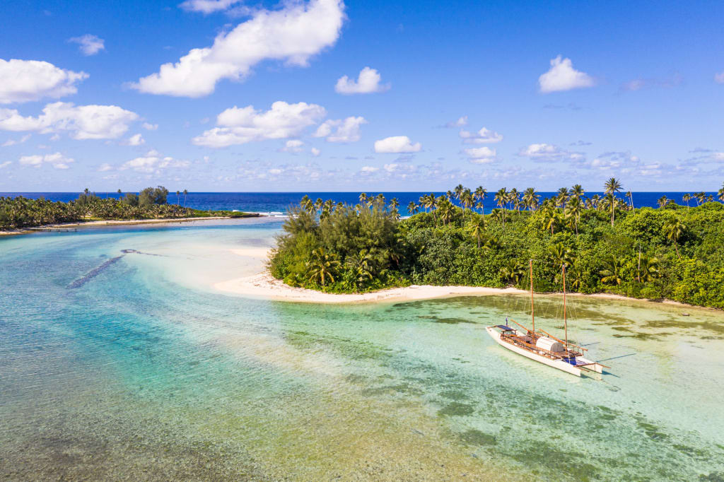 Muri Beach Surrounded by water and small island with different kinds of trees, its also popular turquoise beach best for swimming, snorkeling and water sports like kayaking. 