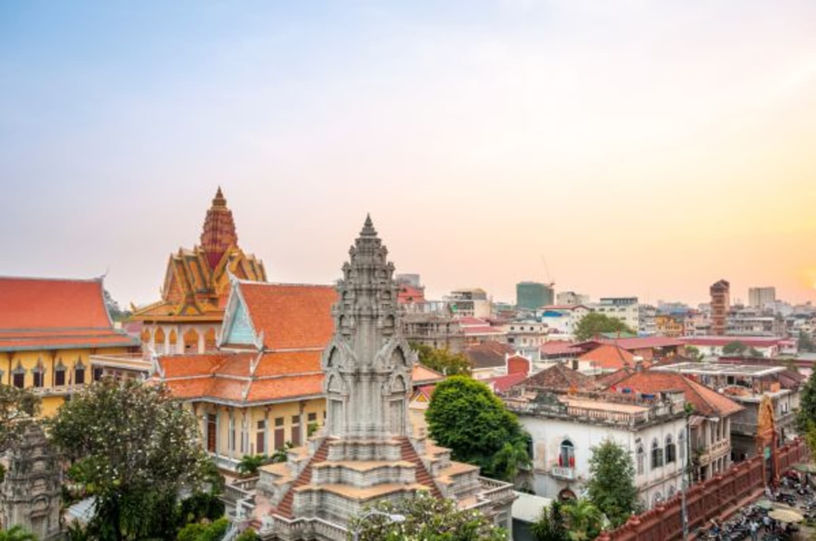 Skyline view of Wat Ounalim at sunset in Phnom Penh