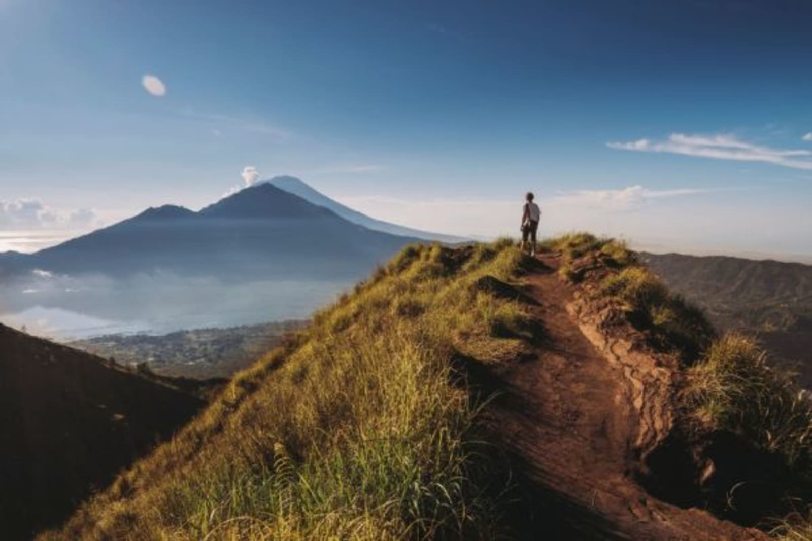 Male hiker looking at view from top of mountain