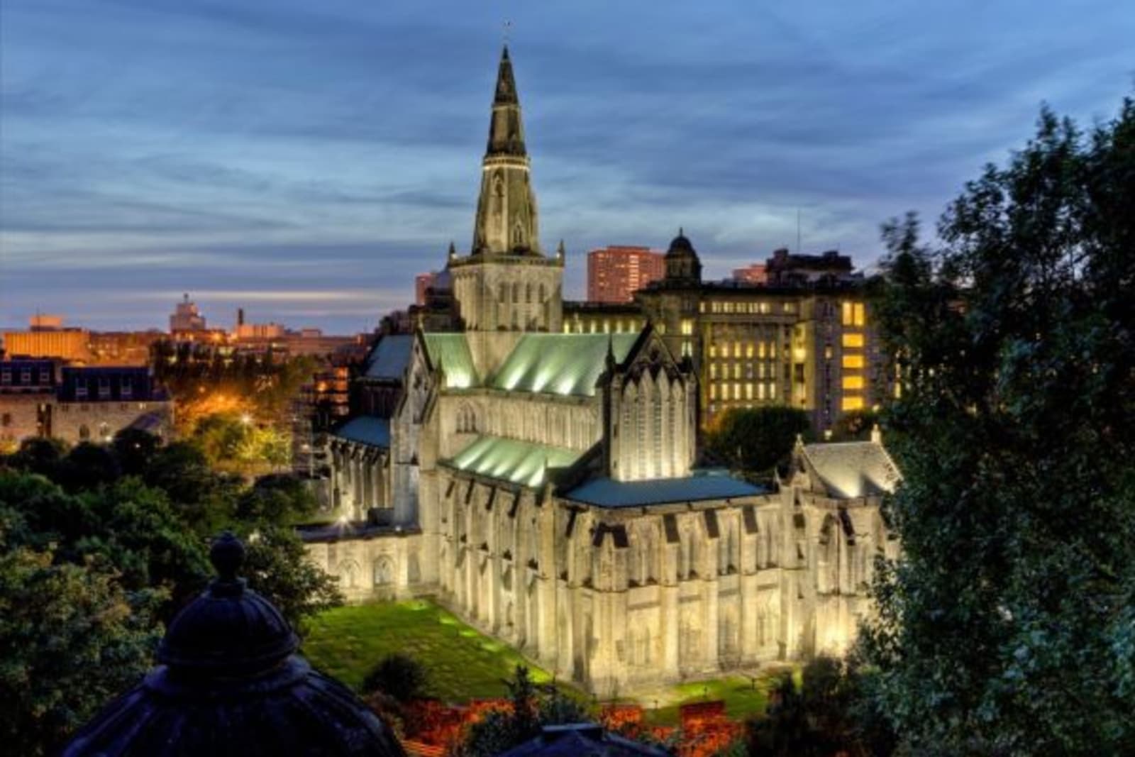 Glasgow Cathedral lite up with ground lights facing upwards