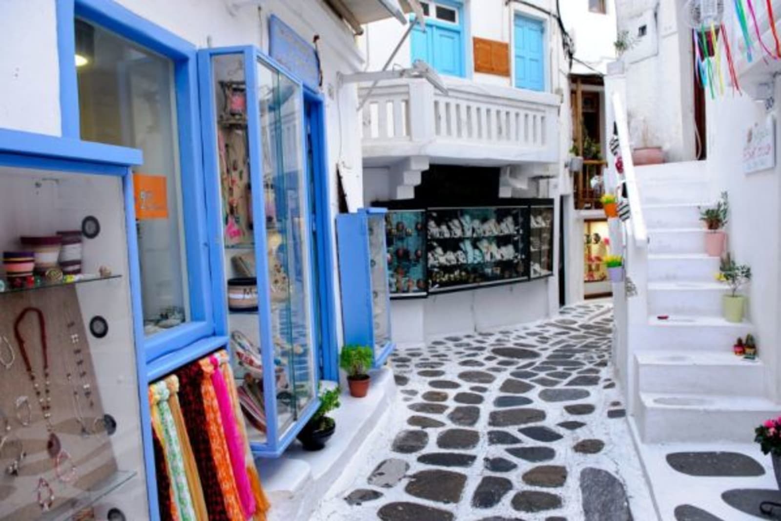 Cobbled stone pathway leading to Greek shops