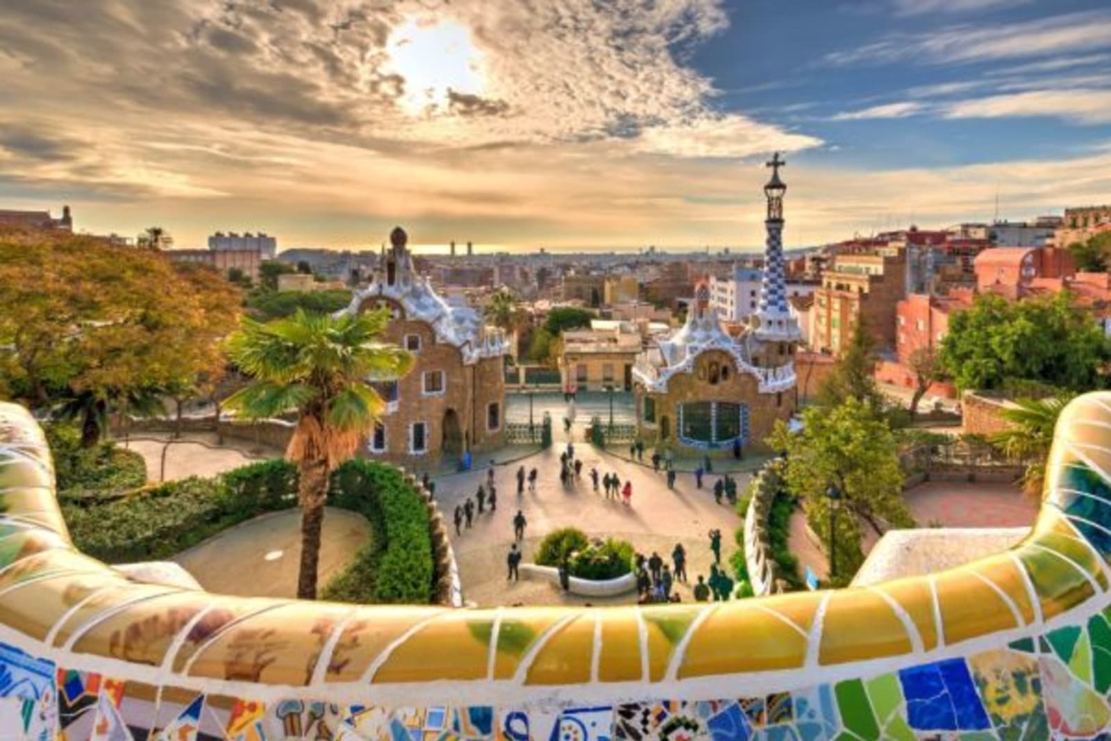 Image of Park Güell with the sun mid peak