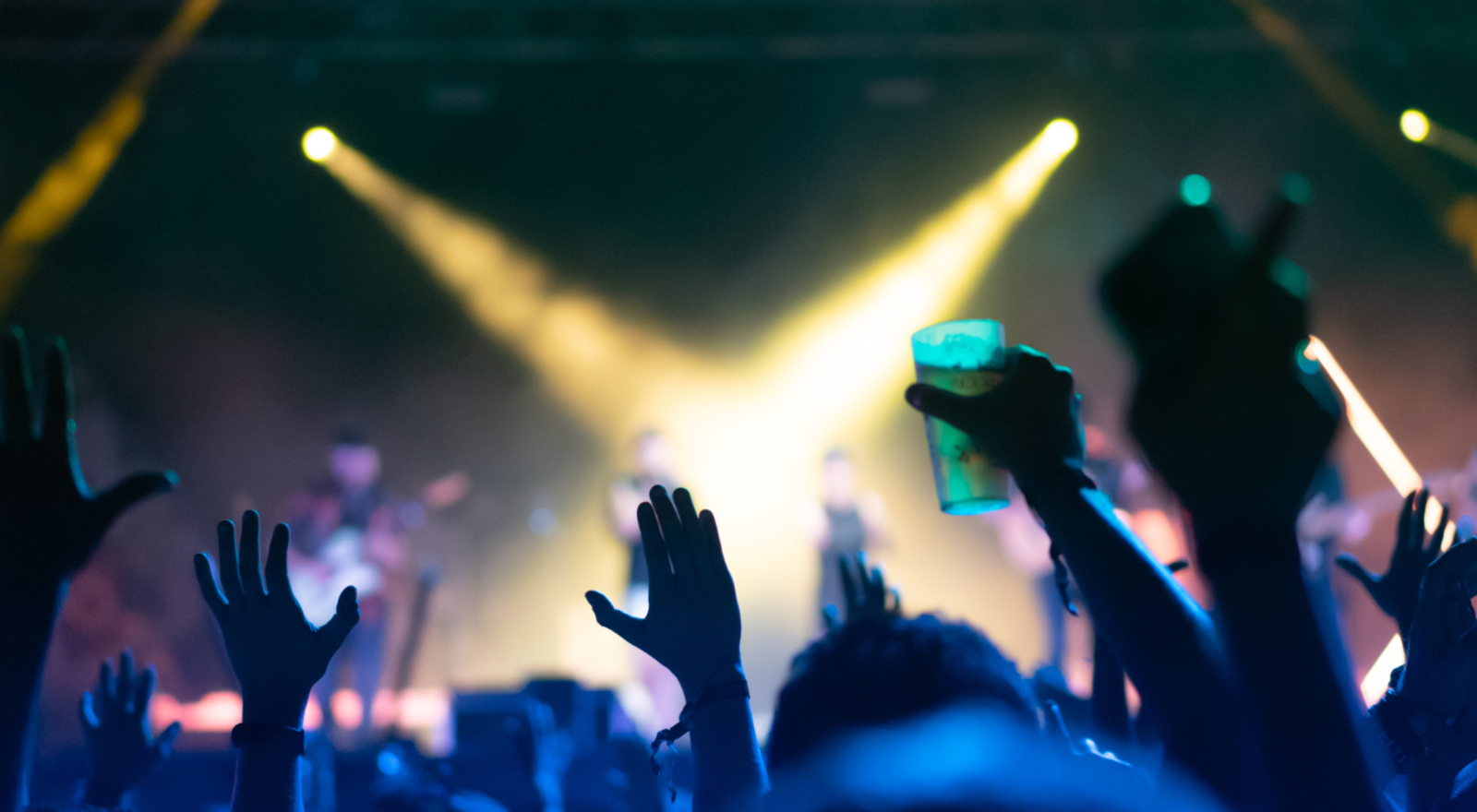 Nightclub, people with their hands up