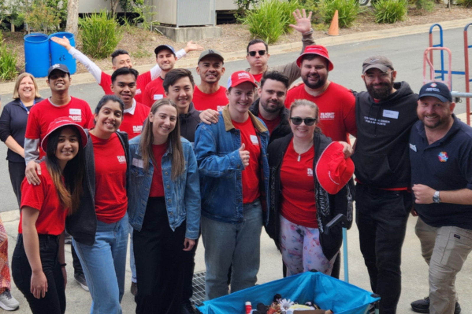 Group of flight centre staff posing for a phot