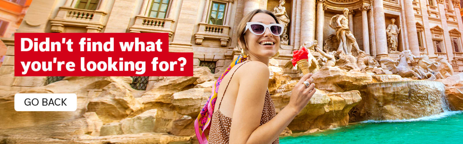 Didn't find what you're looking for? - go back. Woman with an ice cream at the Trevi Fountain