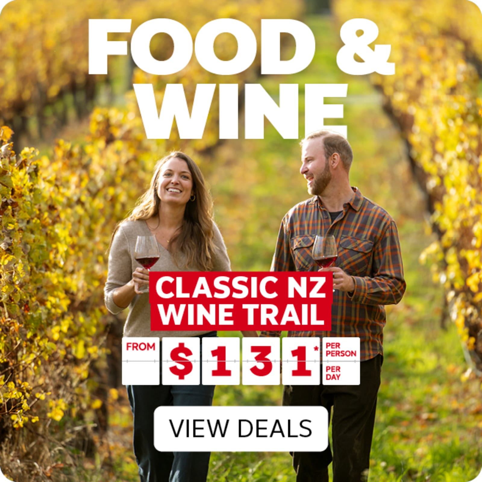 Food & Wine - couple walking through a vineyard, drinking wine | Classic NZ Wine Trail - from $131* per person, per day | View Deals