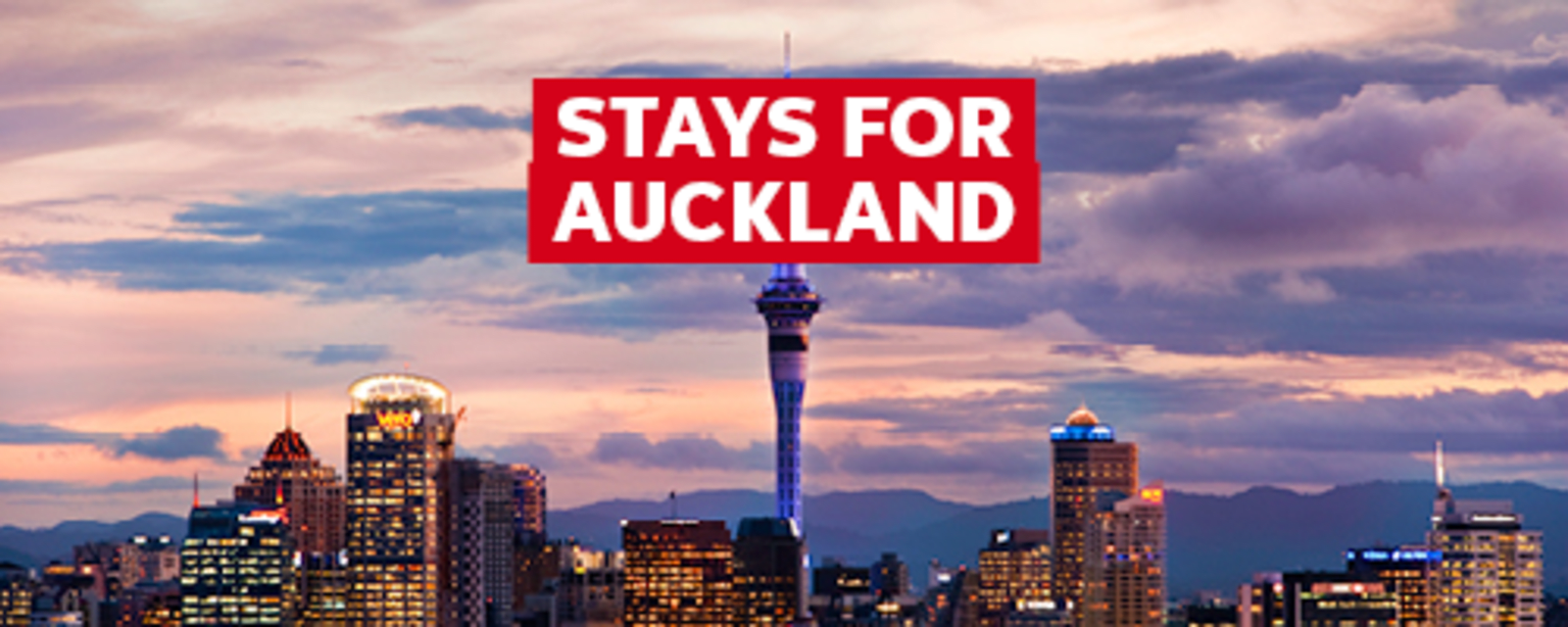 Stays for Auckland - city of Auckland under a cloudy sky