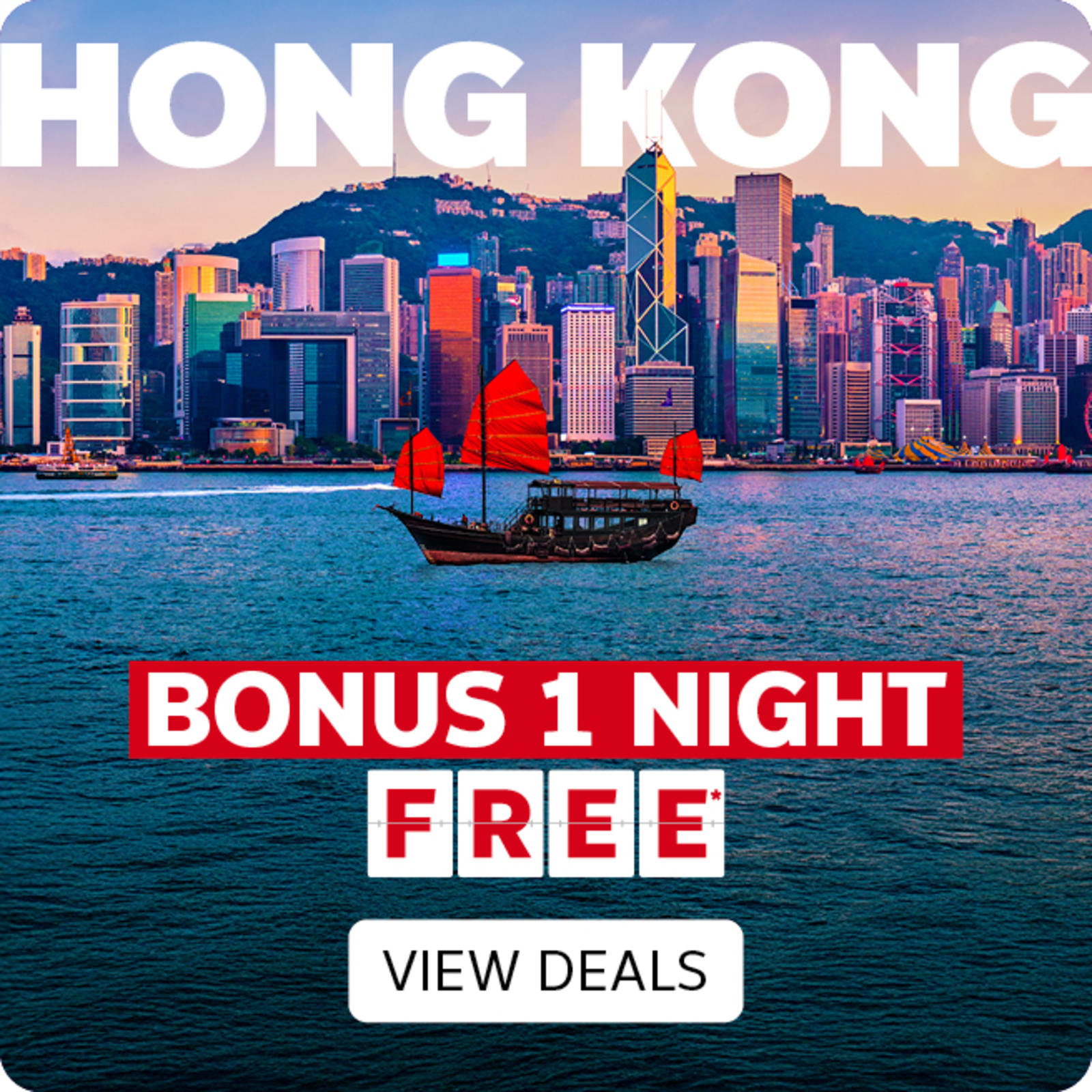 A red Junk sailing past the city of Hong Kong in the later afternoon featuring bonus night free in Hong Kong