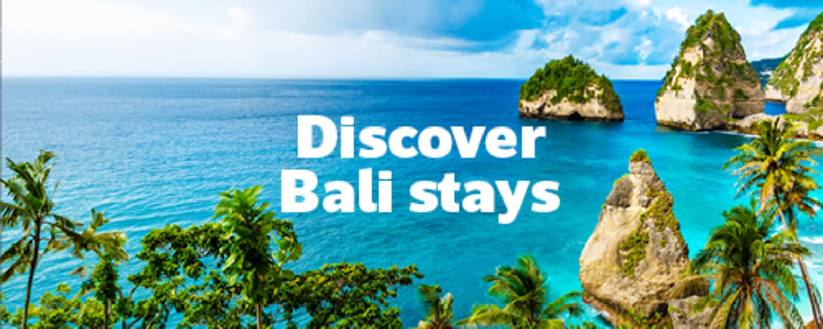 Turquoise waters and dramatic limestone cliffs along the Bali coastline