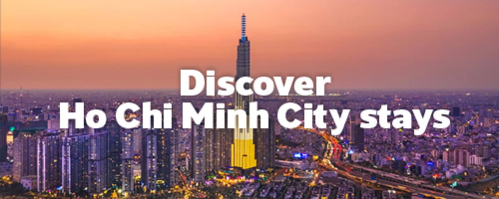 Ho Chi Minh city skyline at sunset with skyscrapers and city lights