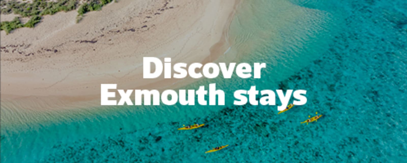 Pristine teal-coloured water with bright white sand featuring Exmouth stays