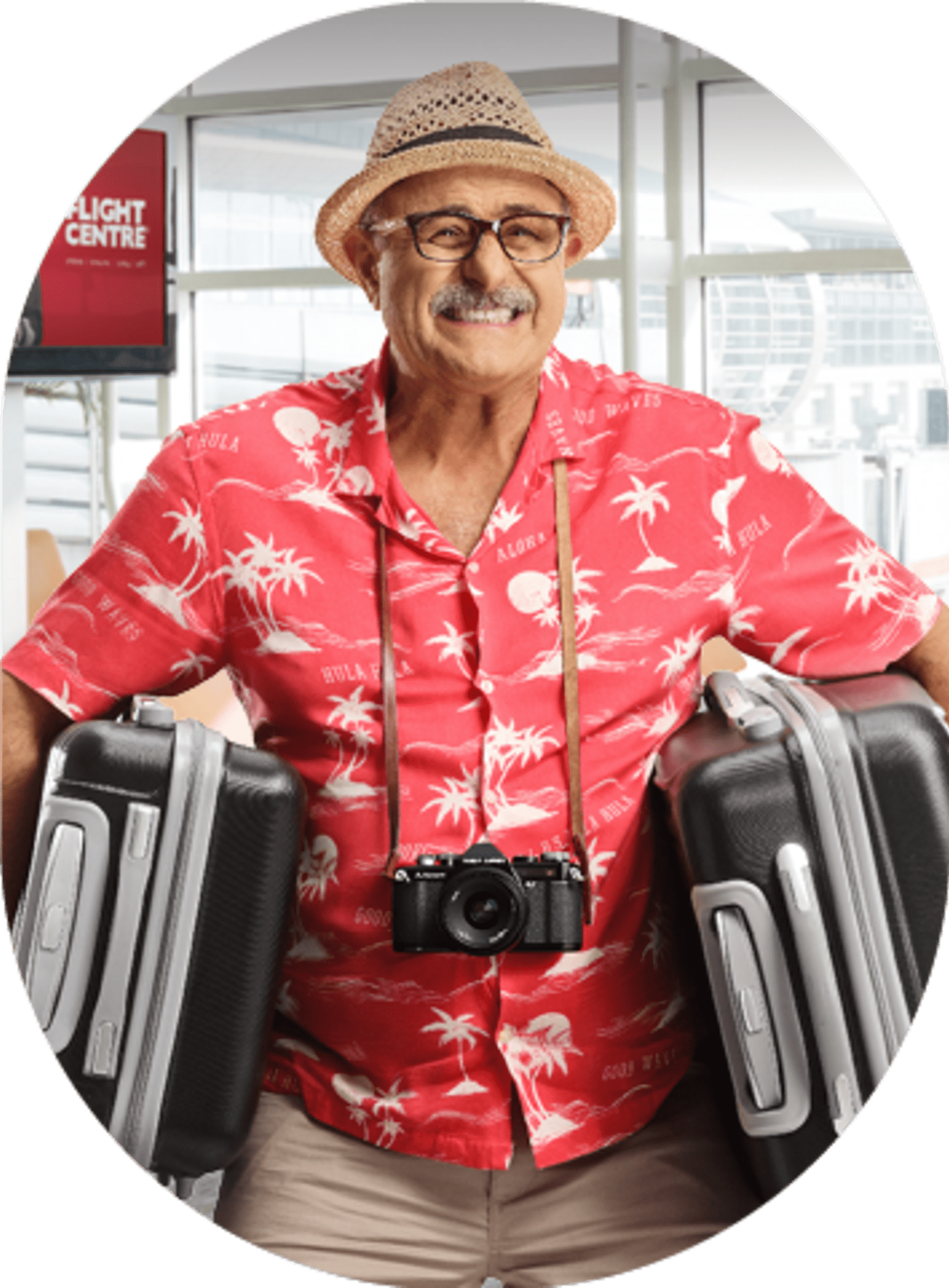 Dad in airport carrying multiple suitcases