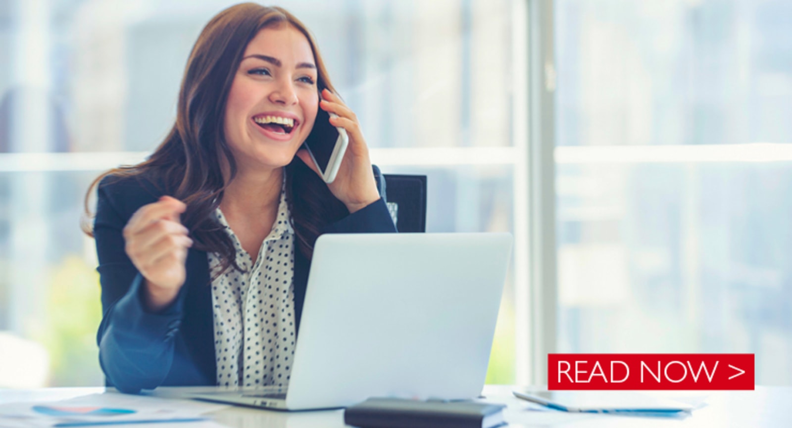 Businesswoman smiling talking on a phone