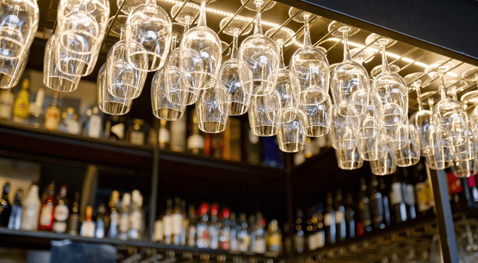 Wine Glasses hanging in a bar