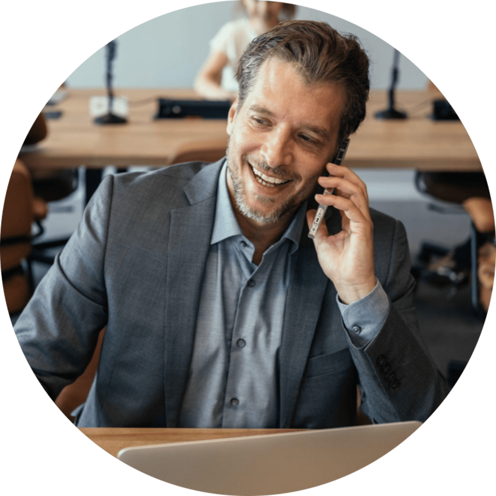 Businessman on his mobile phone, smiling